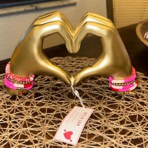 Gold Heart Hand Display with Pink Bracelets